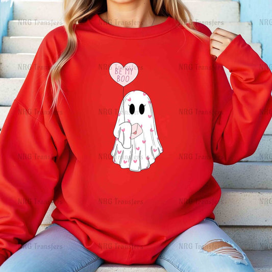 a woman wearing a red sweatshirt with a ghost on it