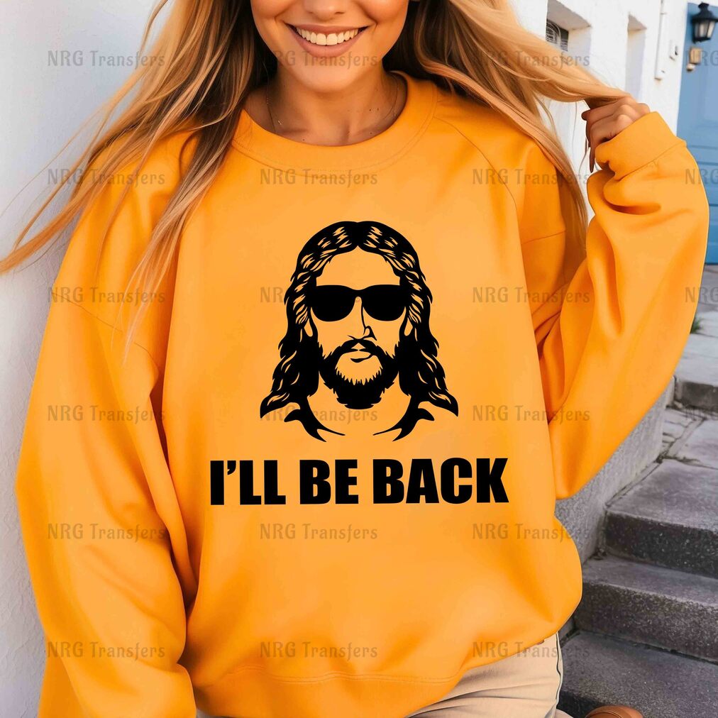 a woman wearing a sweatshirt that says i'll be back