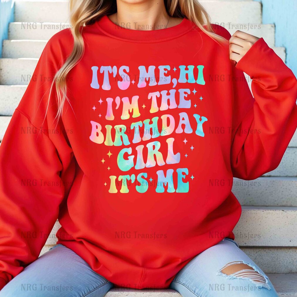 a woman wearing a red sweatshirt that says it's me, i'm