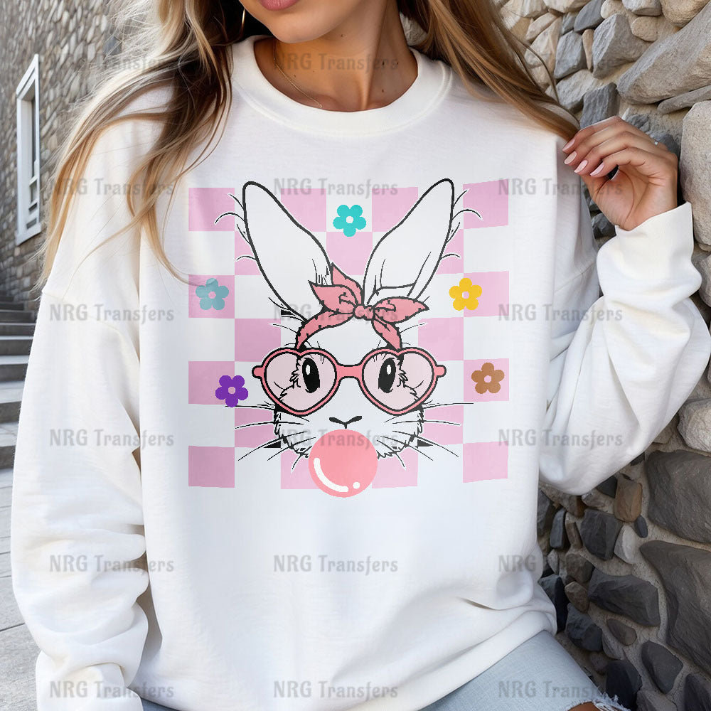 a woman wearing a white sweatshirt with a bunny wearing glasses