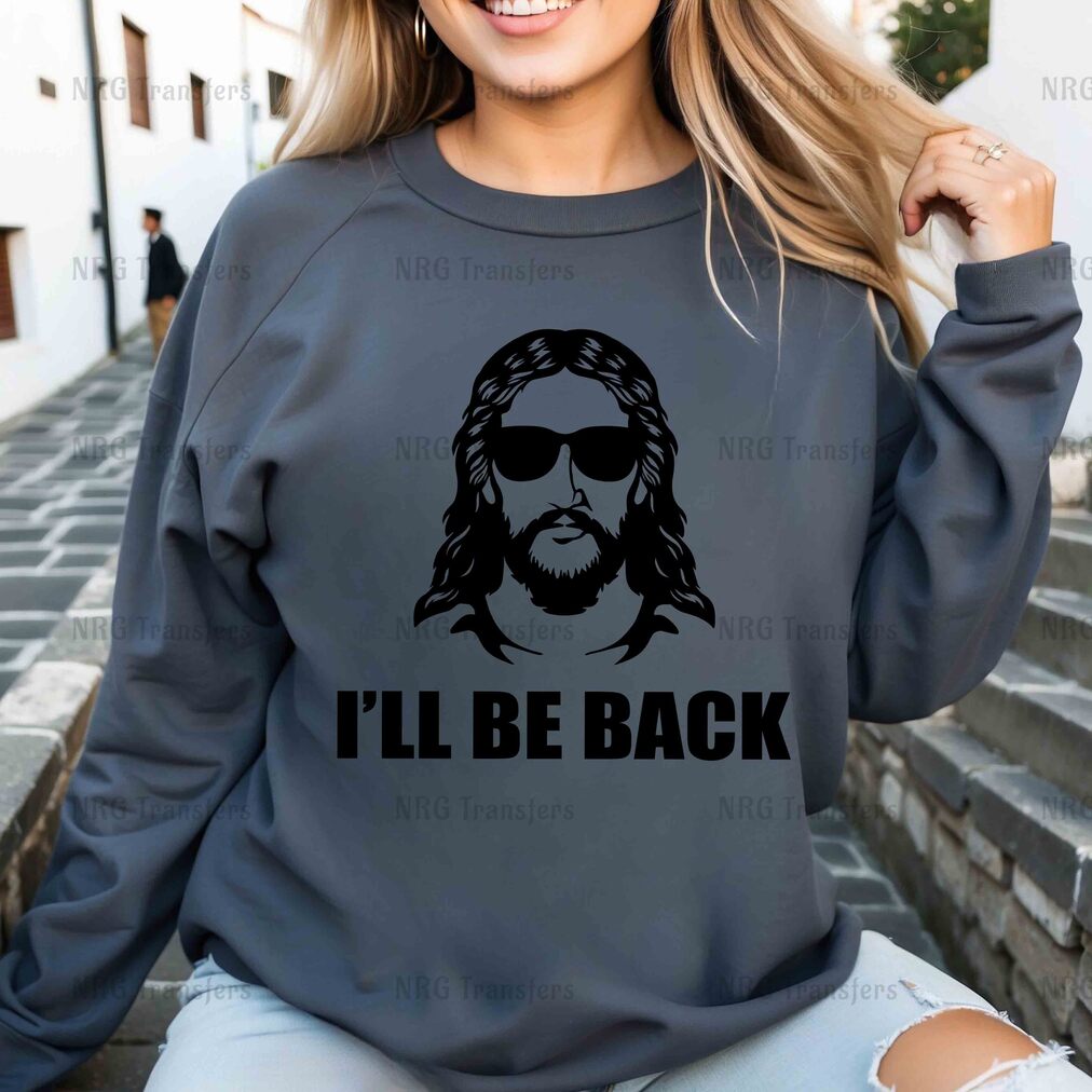 a woman wearing a sweatshirt that says i'll be back