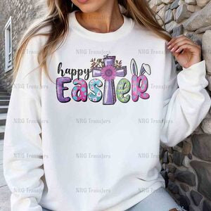 a woman wearing a sweatshirt that says happy easter