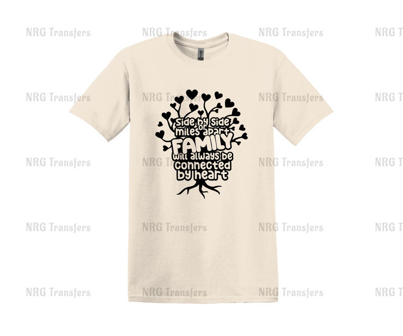 a white t - shirt with a tree and hearts on it