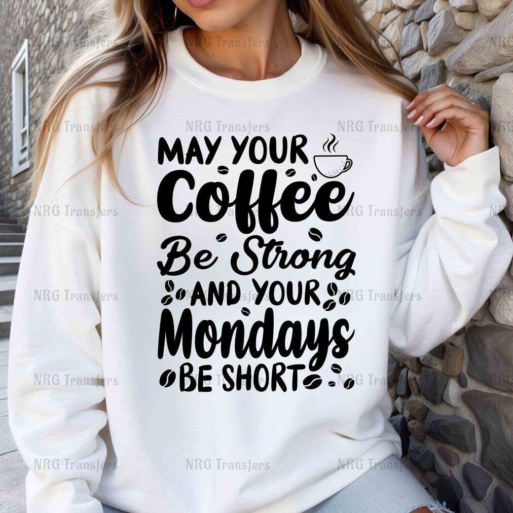 a woman wearing a sweatshirt that says, may your coffee be strong and your monday