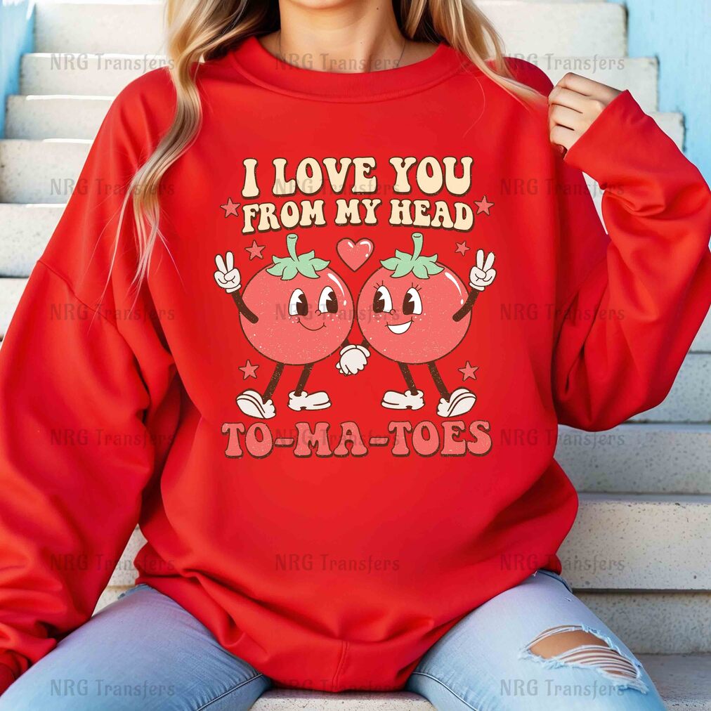 a woman wearing a red sweatshirt that says i love you from my head to ma