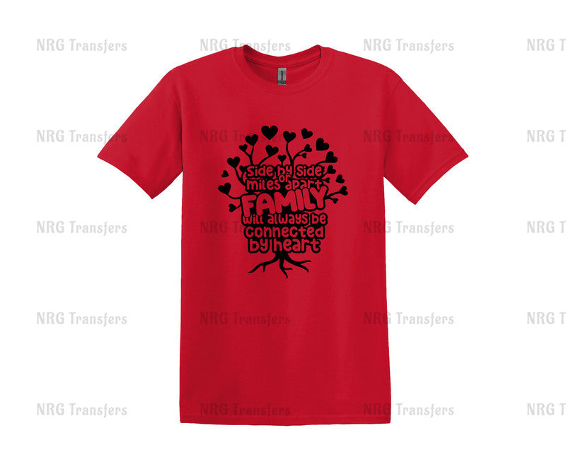 a red t - shirt with a tree and hearts on it