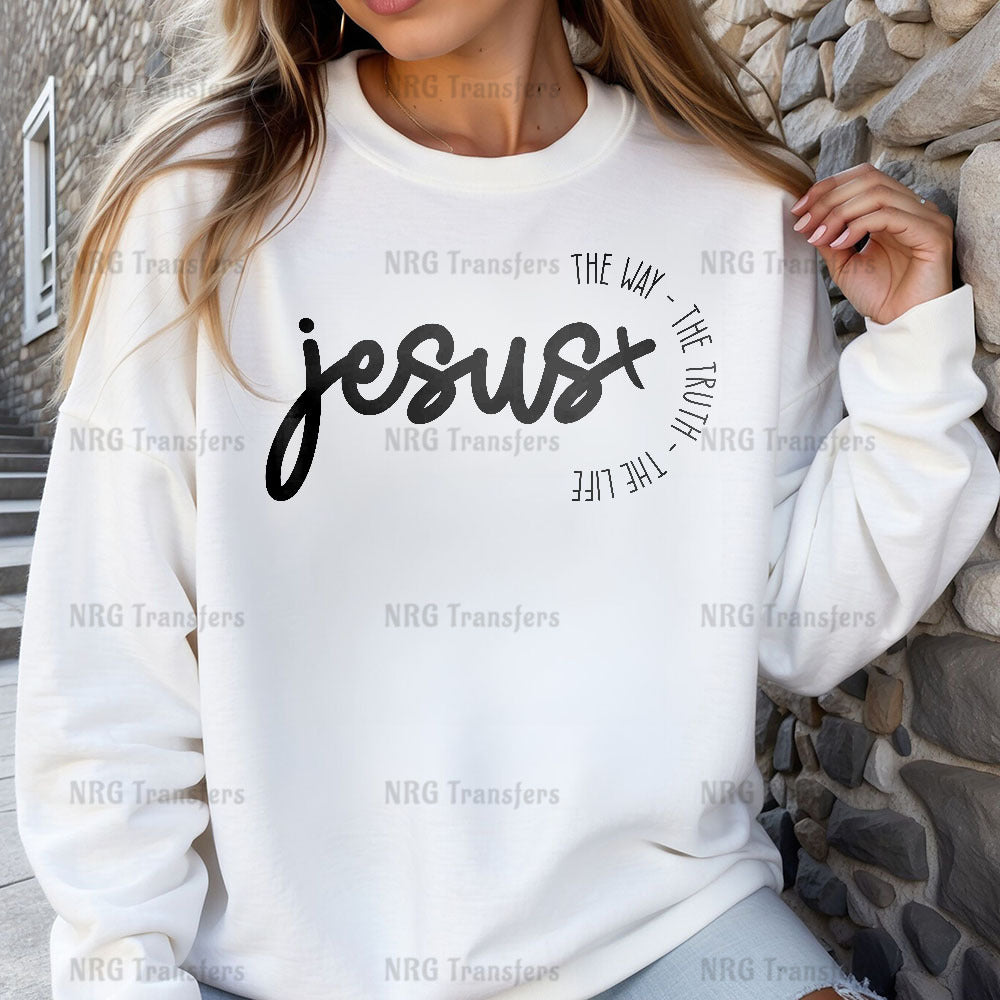 a woman wearing a white sweatshirt with the word jesus printed on it