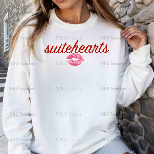 a woman wearing a sweatshirt with the word suitebears on it