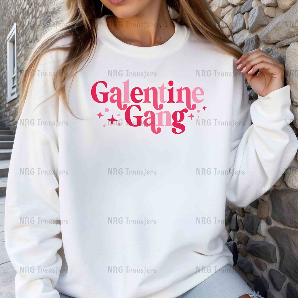 a woman wearing a white sweatshirt with the words gaeinne gaug on it